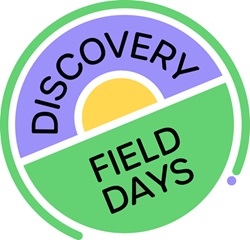 Discovery Field Days logo - circle with in the circle a tilted horizon and a yellow spot above the background is purple and below the background is green, In purple there is the word Discovery round the yellow dot/sun and below in green (field) are the word field and day, both at their own line