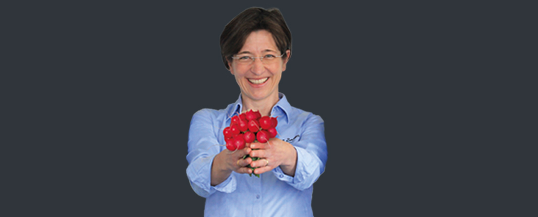Internships R&D: woman holding radishes